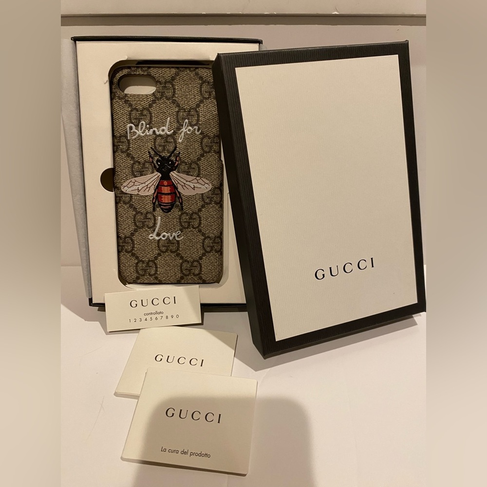 GUCCI I PHONE 7  CASE WITH BUMBLE BEE INCLUDED WITH GUCCI BAG PURCHASE.